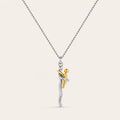 Mother and child pendant in silver and gold on a fine silver chain