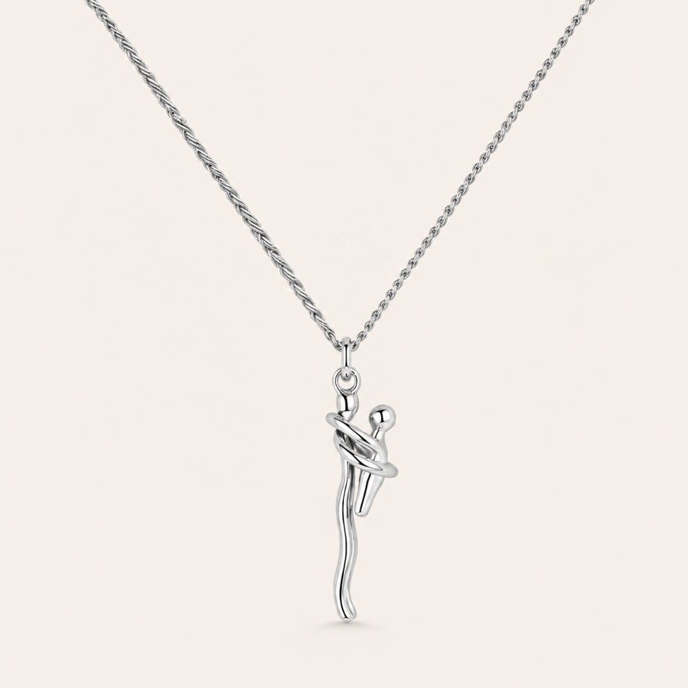 Mother and child pendant in silver on a fine silver chain