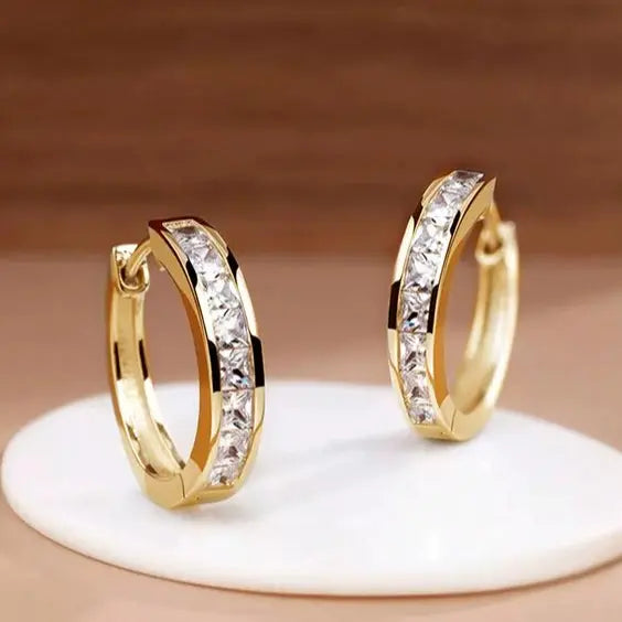 Crystal huggie hoop earrings with a line of set crystals